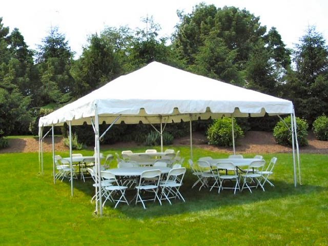 Tent, tables and chairs set up by Sugar Rim Bar